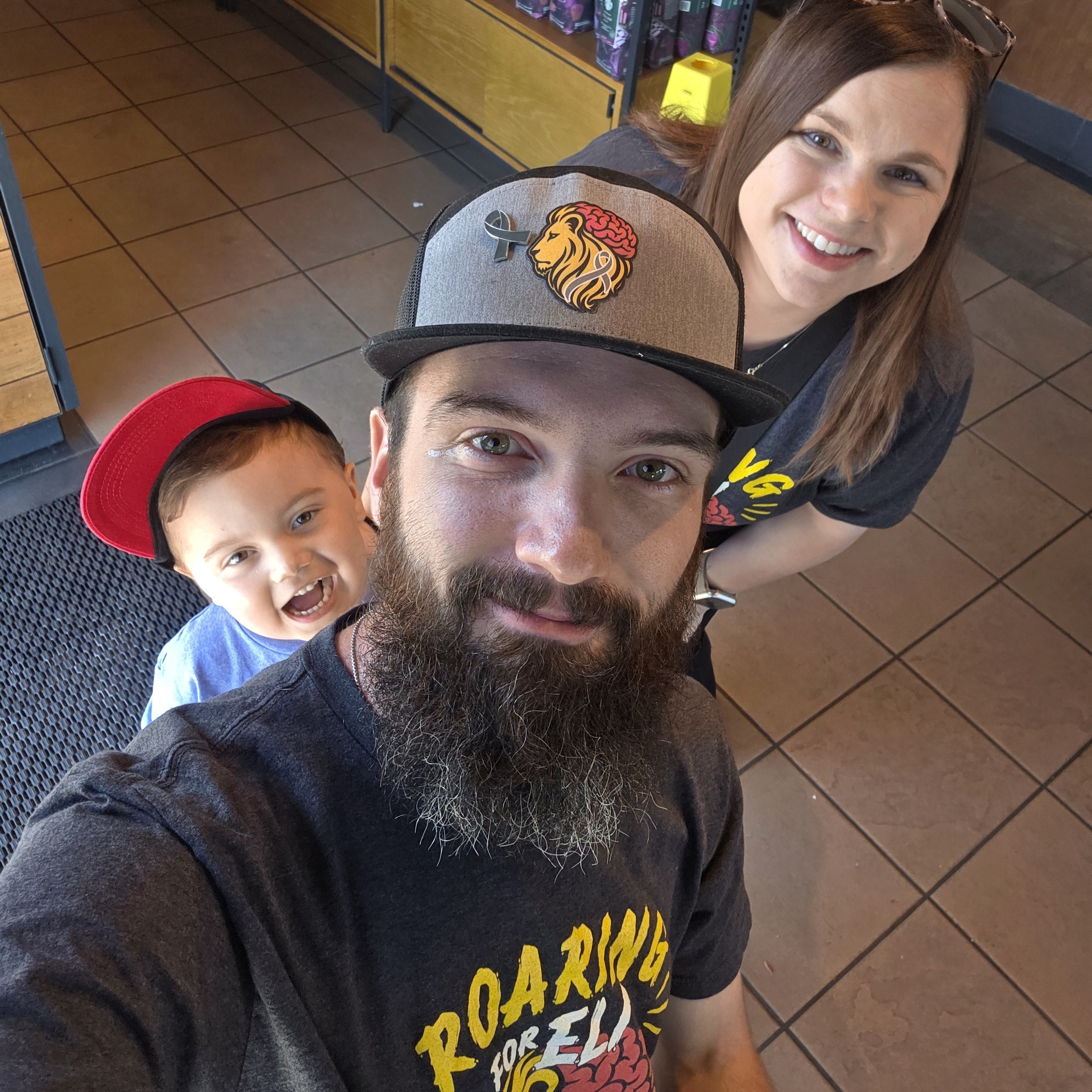 Eli with Mommy and Daddy at Starbucks